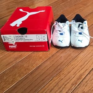 Size 2 Infant shoes. Puma white and blue